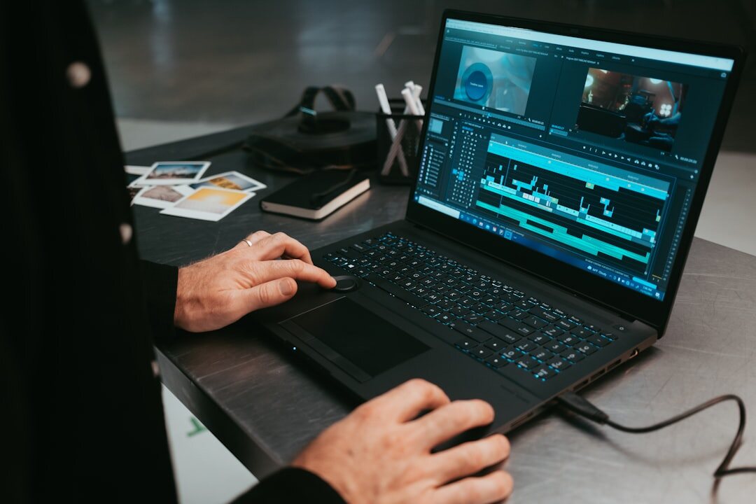 professional video editor at computer